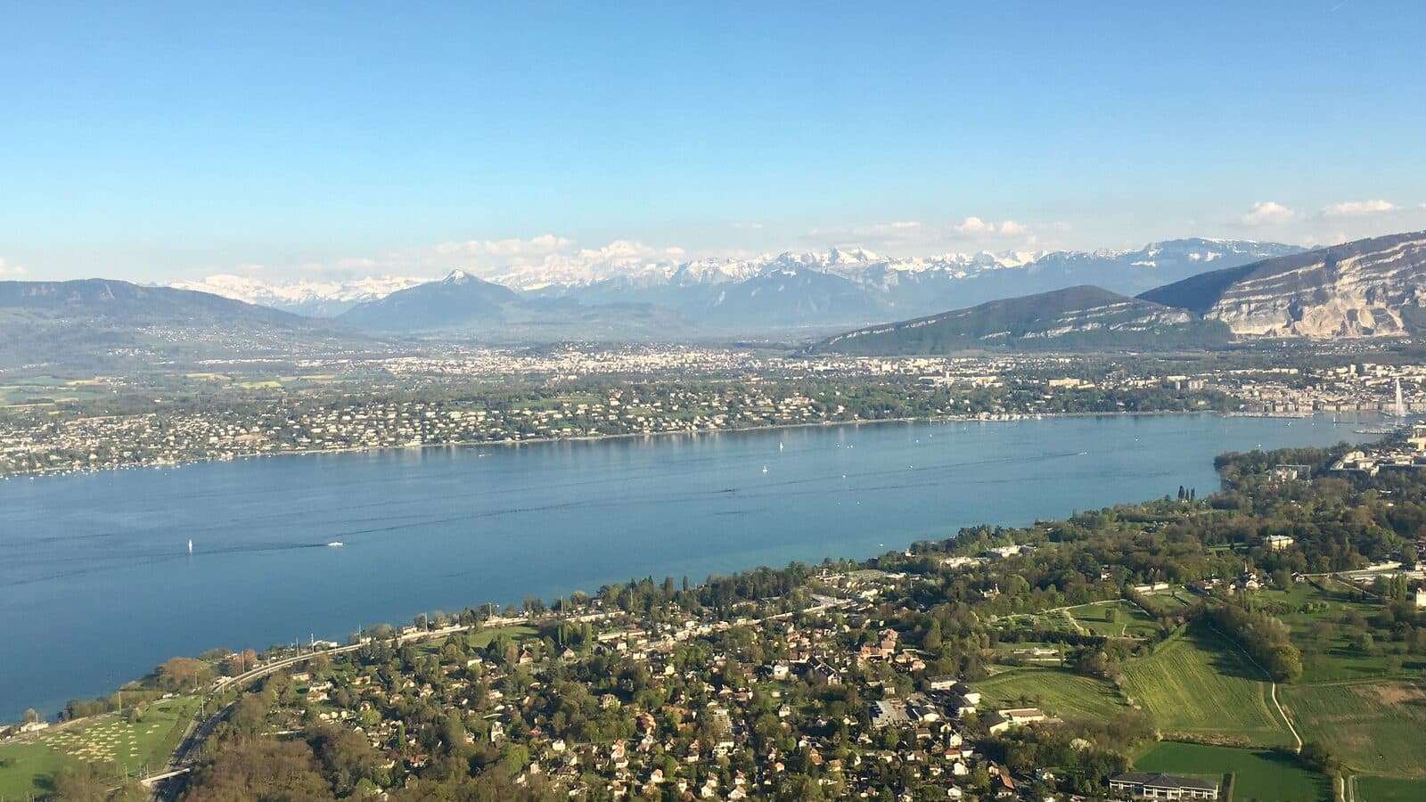 Lake Geneva near Geneva in spring, with the Alps and Mont Blanc in the distance